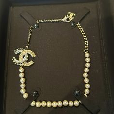 Rare And Gorgeous Chanel Pearl Necklace. Part Of Chain Is Woven Black Leather. Large Chanel Cc Logo In Pearl, Rhinestone, And Black Leather Woven Gold Chain. Retail $1200! Chanel Pearl Necklace, Chanel Pearl, Chanel Pearls, Chanel Jewelry, Leather Weaving, Cc Logo, Leather Necklace, Girls Best Friend, Gold Chain