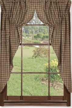 an open window with a plaid curtain and valance