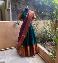 Wedding lehenga choli/ lehenga set with dupatta / teens lehenga/ bridal lehenga/ kids lehenga / narayanpet lehenga / crop top lehenga/ lehenga USA / Langa voni / voggish / green purple lehenga / pattu pavadai Here is a beautiful and traditional Indian pattu narayanpet cotton lehenga in green color paired with purple border dupatta is a stunning piece for your upcoming parties!! It's a 3 piece set that includes skirt , can be done in other combinations and customizable !! Please contact us for en Green Maxi Length Choli With Dupatta, Designer Navratri Gown With Traditional Drape, Designer Anarkali Saree Maxi Length, Designer Wear Anarkali Saree In Maxi Length, Festive Pre-draped Saree With Tilla In Traditional Drape, Festive Pre-draped Saree With Tilla, Green Maxi Length Sharara With Pallu, Anarkali Set With Unstitched Blouse, Designer Saree For Diwali In Maxi Length