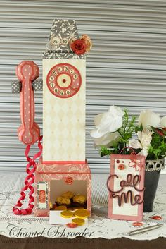 an assortment of decorative items displayed in front of a garage door with the word love spelled out