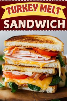 this turkey melt sandwich is loaded with cheese, ham, and lettuce it's ready to be eaten