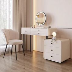 a white dresser sitting next to a chair in a bedroom on top of a hard wood floor