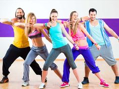 a group of young people dancing in a dance studio