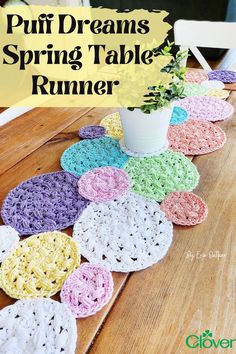 a crocheted table runner with flowers on it and the words puri dreams spring table