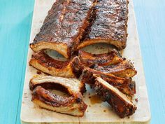 ribs on a cutting board cut into four pieces