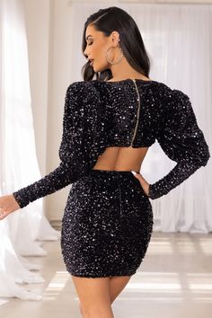 Make up for lost time and party the night away in our “Daring” black mini! This statement sequin piece is just what your wardrobe needs. a stunning velvet dress featuring all over sequin detail. extreme plunge neckline and puff sleeves. This mini's thigh-skimming hemline shows off your beautiful bronzed pins and flatters with the cut out side detail which cinches in your waist. Cheers...let this season's celebrations commence!Where to WearPerfect for Cocktails. date nights and going out out with Statement Gold Necklace, Velvet Prom Dress, Dress With Puff Sleeves, Velvet Mini Dress, Black Tie Gala, Lost Time, Linen Mini Dress, Plunge Neckline, Ruffle Mini Dress