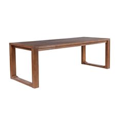 a wooden table sitting on top of a white wall