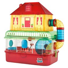 a toy house is sitting on top of a hamster