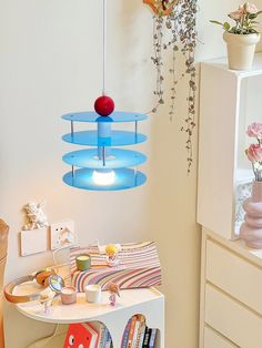 a room filled with lots of different types of furniture and decor on top of a white table