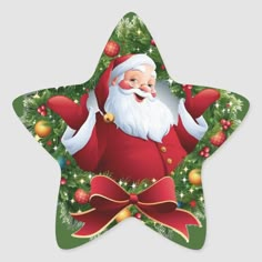 a star shaped sticker with a santa clause on it's face and christmas decorations around the edges