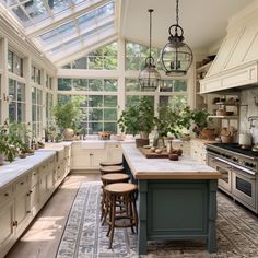 a kitchen filled with lots of counter top space next to a stove top oven and refrigerator