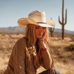 The Lobo 10X Straw Cowboy Hat is constructed of 10X quality straw and features an all-around ventilated cattleman crown and leather hatband with silver and gold toned accents. 10X Quality Straw. Made in USA. Brim: 4 1/4" Crown: 4 1/8" Regular Oval 10X Collection Women In Cowboy Hats, Womens Cowboy Hats, Straw Cowboy Hat Outfit, Woman Cowboy Hat, Women Cowboy Hats, Cowboy Hat Aesthetic, Womens Straw Cowboy Hat, Cowboy Hat Women, Western Hats For Women