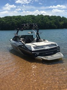 a boat is in the water near some trees