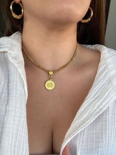 "SPRING SALE                Buy 1 item - Get 10% off                    Buy 2+ items - Get 20% off + Free worldwide shipping ❤ Welcome to My Store ❤ Our unique sun necklace is the hot and trendy thing of the season! This gold pendant necklace can be used as a perfect gift for a trendy woman with a fine style,  In addition, we will package the necklace for you in a festive gift box to complete the experience! ♦ Measurements ♦ Necklace length:  16.3\" + 2\" extension chain / 41.5 cm + 5 cm extensi Trendy Tarnish Resistant Charm Necklaces, Trendy Round Pendant Jewelry, Trendy Sun Design Jewelry, Trendy Round Choker Necklace For Gift, Gold Charm Necklace With Sun Design, Sun-shaped Necklace For Summer Gifts, Sun Design Charm Necklace Gift, Trendy Gold Jewelry With Sun Design, Sun-shaped Necklace As A Summer Gift