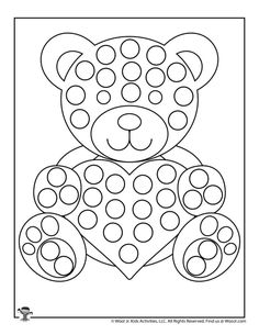 a teddy bear with circles on it's face