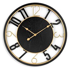 a black and gold clock with numbers on the face is shown against a white background