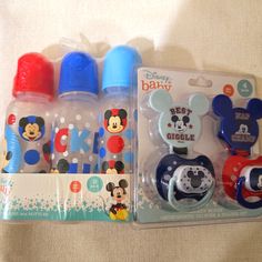 mickey mouse baby bottles and pacifiers in packaging