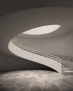 a spiral staircase in a concrete building