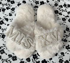 Thank you for visiting Designs By Kenia! Every time you shop small, you are supporting someone's dream and I am SO thankful that you have chosen to support mine! Quinceañera Faux Fur Slippers|Mis Quince Slippers|Quince Personalized Gifts|MisXV Gifts Slippers can be customized  Our slippers are hand custom made for you and it can be customized with your own text. The material we use is faux fur which makes it so plush and fluffy, just perfect to spoil your feet The custom letters are hand made with care and love./ I do not recommend washing the slippers. Quince Slippers, Quince Gift Ideas, Quince Gifts, Quinceanera Shoes, Quince Ideas, Love Me Do, Gift Inspo, Faux Fur Slippers, Fur Slippers