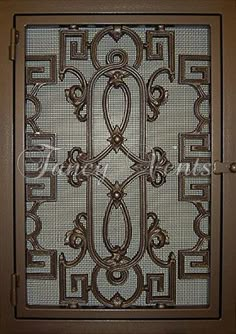 a decorative door with an intricate design on it