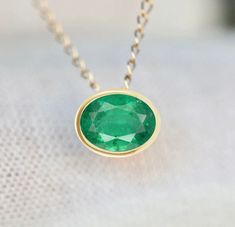 Genuine emerald set in 14k gold. Stone Size : see options Necklace Length : see options Metal : 14k Gold Gemstone : Emerald Packaging : All products purchased from us come in a gift box. If you need to include a message, kindly leave us a note when purchasing. Care Recommendations: When not in use, keep earrings enclosed in a box or pouch to minimize exposure to moisture in air. Do not spray aromatics directly onto product. Minimize exposure to water. Clean with a soft cloth when required. Green Gemstone Necklace, Emerald Set, Emerald Style, Diamond Stacks, Natural Diamond Ring, Solitaire Necklaces, May Birthstone, Necklace Minimalist, Everyday Necklace