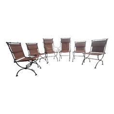 six brown chairs sitting next to each other on top of a white surface with no one in it