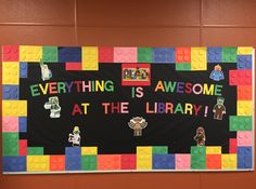 a bulletin board with legos on it that says everything is awesome at the library