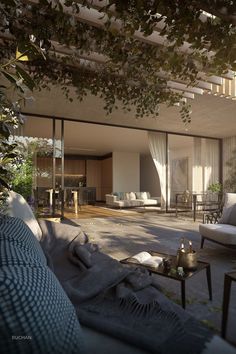 an open living room and dining area with sliding glass doors