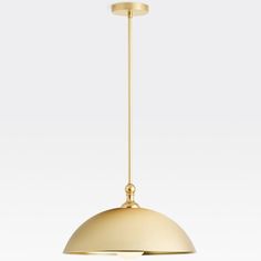 a brass colored pendant light hanging from the ceiling