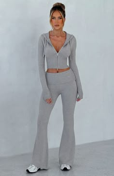 The Portia Knit Pants are a must-have for any wardrobe. These versatile pants feature a flattering fit and flare silhouette. with a wide rib waistband for added style. Complete the look with the matching Portia knit hoodie.   Colour: Light Grey Marl. Regular length. Unlined. Fit and flare silhouette. Wide 2x2 rib waistband. Fold over waistband detail. Internal elastic in waistband. Model is an XS and is wearing an XS. Homecoming Dresses Corset, Pink Monochrome, Midi Dress Wedding Guest, Split Long Dress, Versatile Pants, Maxi Dress Sale, Popular Dresses, Sparkle Dress, Maxi Dress Navy