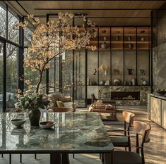 a dining room table surrounded by chairs and tables