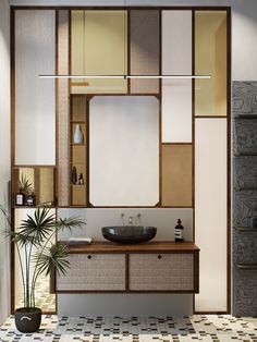 a bathroom with a sink, mirror and plants on the counter top in front of it