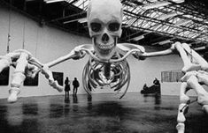 a skeleton is standing in the middle of a room