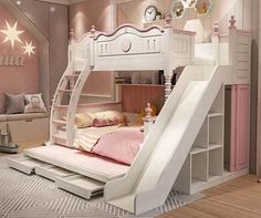 a white bunk bed with a slide in the middle