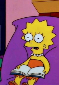 the simpsons is reading a book in bed