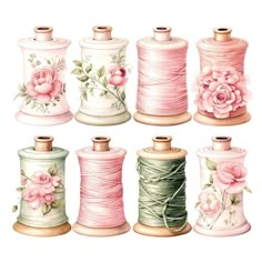 the spools of thread are decorated with pink flowers