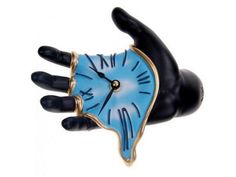 a black hand holding a blue clock on it's palm with gold trimmings