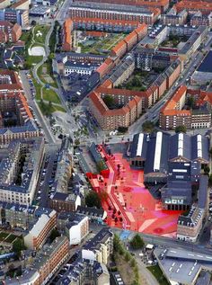 an aerial view of a city with lots of buildings