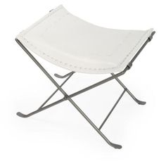 a white leather stool with metal legs and an iron frame on the bottom, isolated against a white background