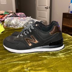 Black And Bronze With Gray Lace New Balance Pretty Much Brand New. I Think I Wore One Time Just Around The House. No Damage Look Brand New New Balance Trail, New Balance 410, Size 11 Women Shoes, Shoes New Balance, New Balance Black, House No, New Balance 574, New Balance Women, Blue Sneakers