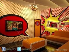 a living room decorated in comic style with pop art on the walls and an orange couch