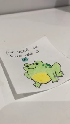 a piece of paper with a drawing of a frog on it