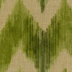 an abstract green and beige pattern on fabric