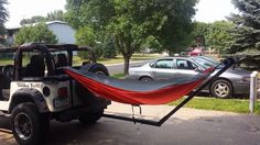 a jeep with a hammock attached to it