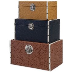 three leather boxes stacked on top of each other in different colors and sizes, with the lids closed