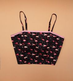 "-Made to Order- Many girls love crop top. Here it is in cute flamingo print! from Amordress:) Top Design: -Adjustable spaghetti straps style -fabric straps. -Back self-tied bow ✄ SIZE ✄ Top Size: S Bust 31\"-34\" M Bust 36\"-38\" L Bust 39\"-40\" XL Bust 41-43\" Top length is around 15\"-16\" depends on how much straps is adjusted. ✄ MATERIAL ✄ ●Cotton Fabric ●Polyester lining material. ♥ Matching pearl necklace/ affordable jewelry CLICK=> https://www.etsy.com/shop/Amordress?section_id=14993 Black Cropped Swimwear For Summer, Black Tops For Beach Party, Black Tops For Beach Party In Beach Season, Cute Black Summer Crop Top, Cute Black Crop Top For Summer, Pink Casual Triangle Crop Top, Black Printed Crop Top, Casual Pink Triangle Crop Top, Pink Cropped Top For Vacation