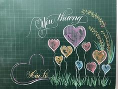 a chalk board with hearts drawn on it