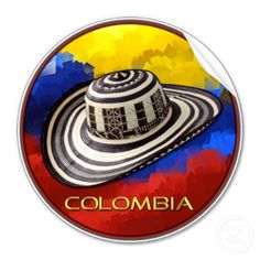 the logo for colombia is shown on a white and red circle with an image of a saturn