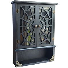 an ornate wooden cabinet with glass doors