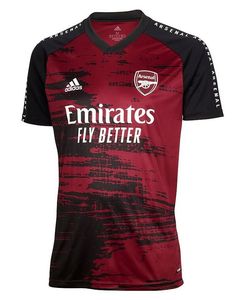 a red and black soccer jersey with the words emiratess fly better on it